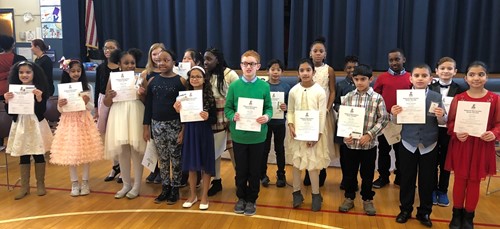 Students Holding Certificates