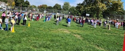 Student Dancing on a Lawn