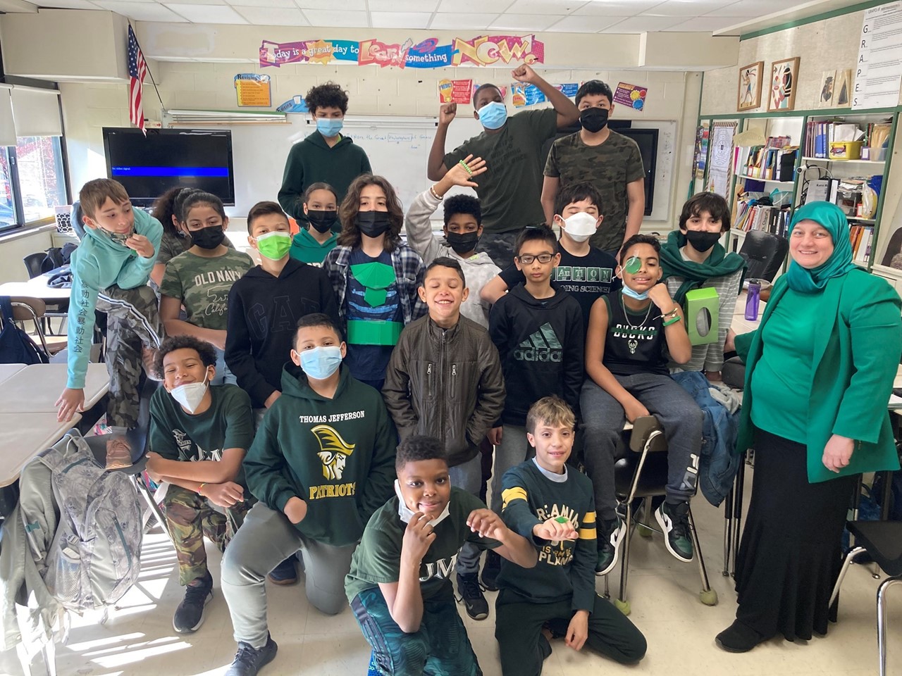 Students in Mrs. Charaf&#39;s class wearing green