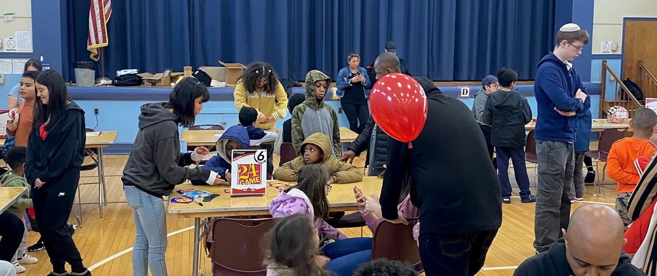 People in a School Gym