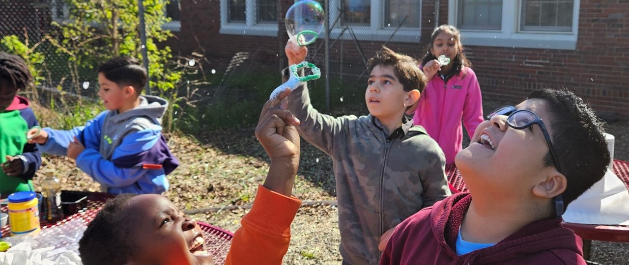 Students Blowing Bubbles