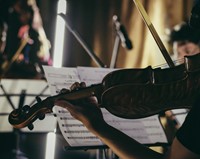 Student Playing the Violin